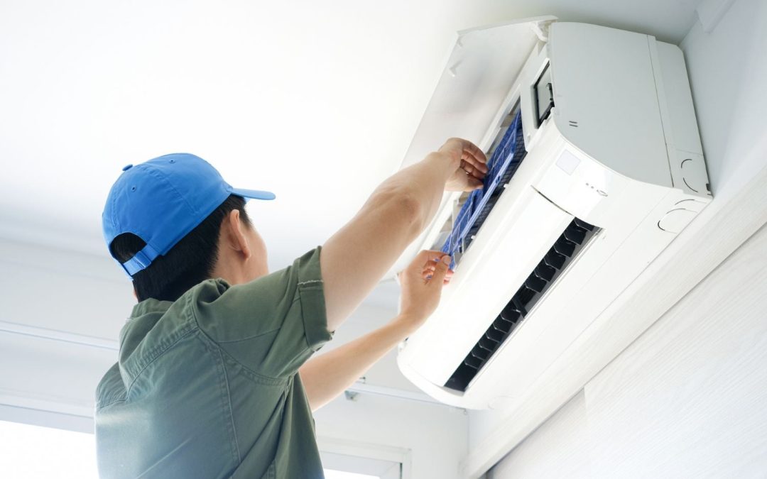 HVAC technician servicing a ductless mini split in South San Francisco