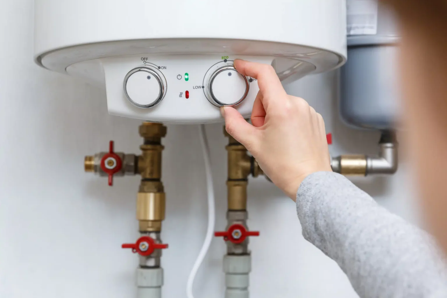 Technician adjusting a water heater in South San Francisco